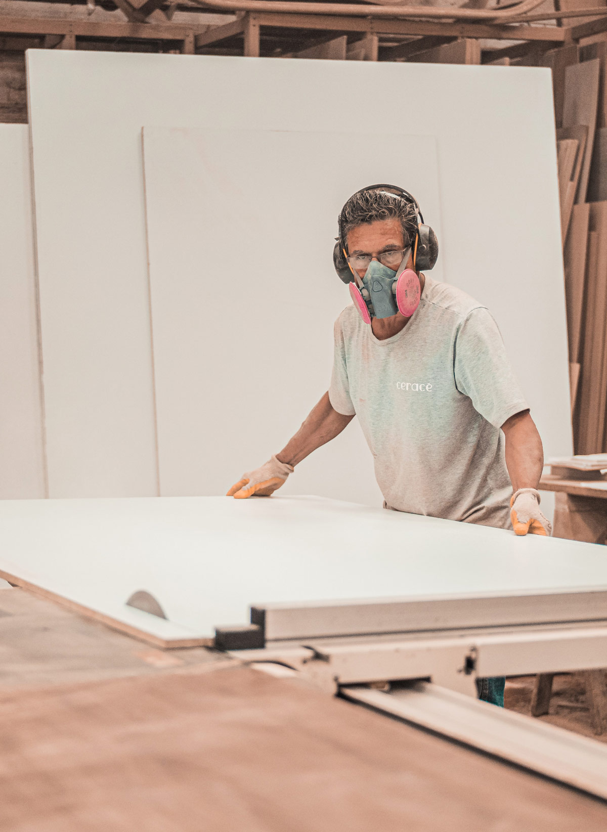 Man Working On A Wooden Board Web